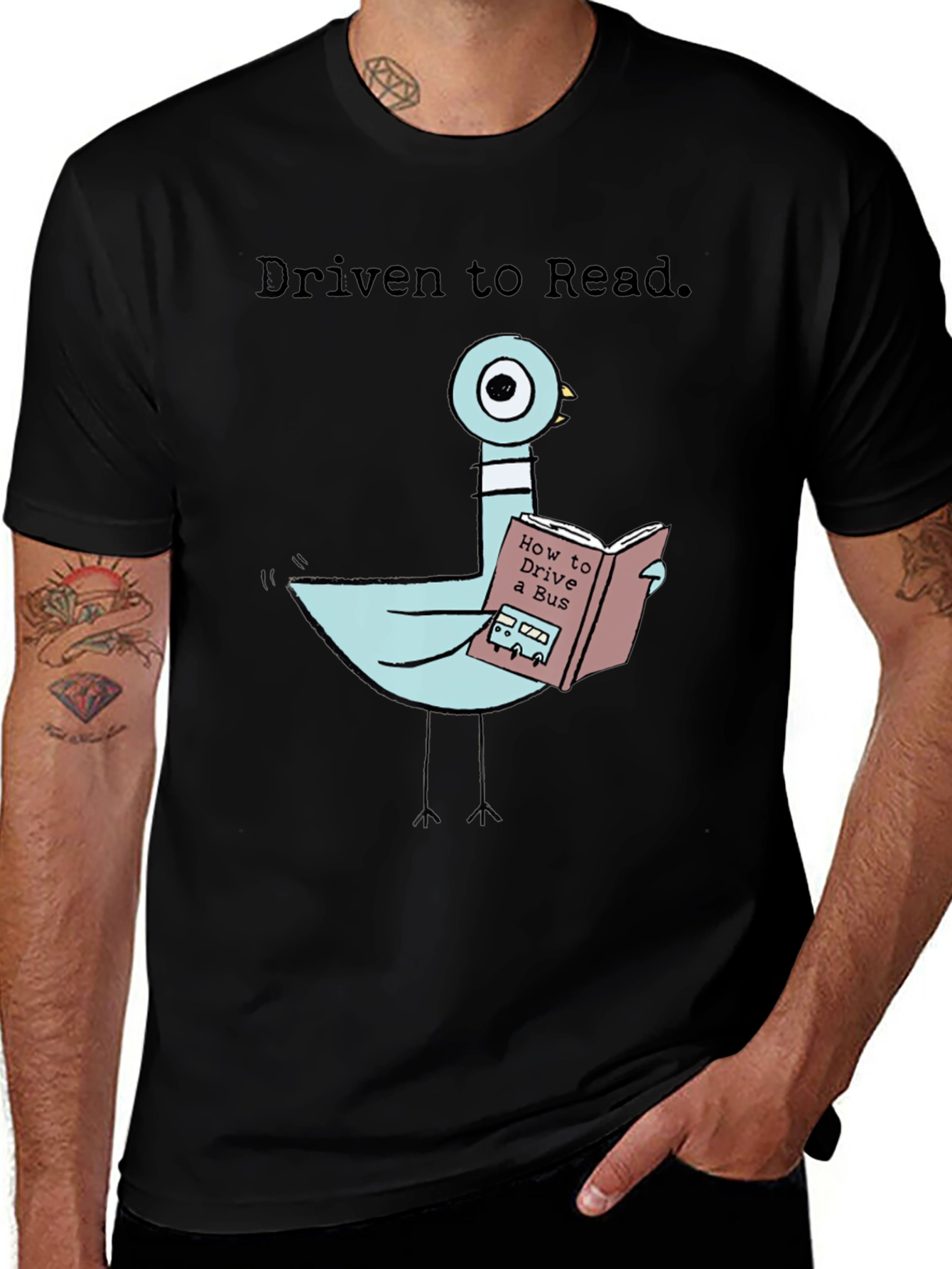 Variant 16 of Driven to Read T-Shirt: Pigeon Reading Bus Book