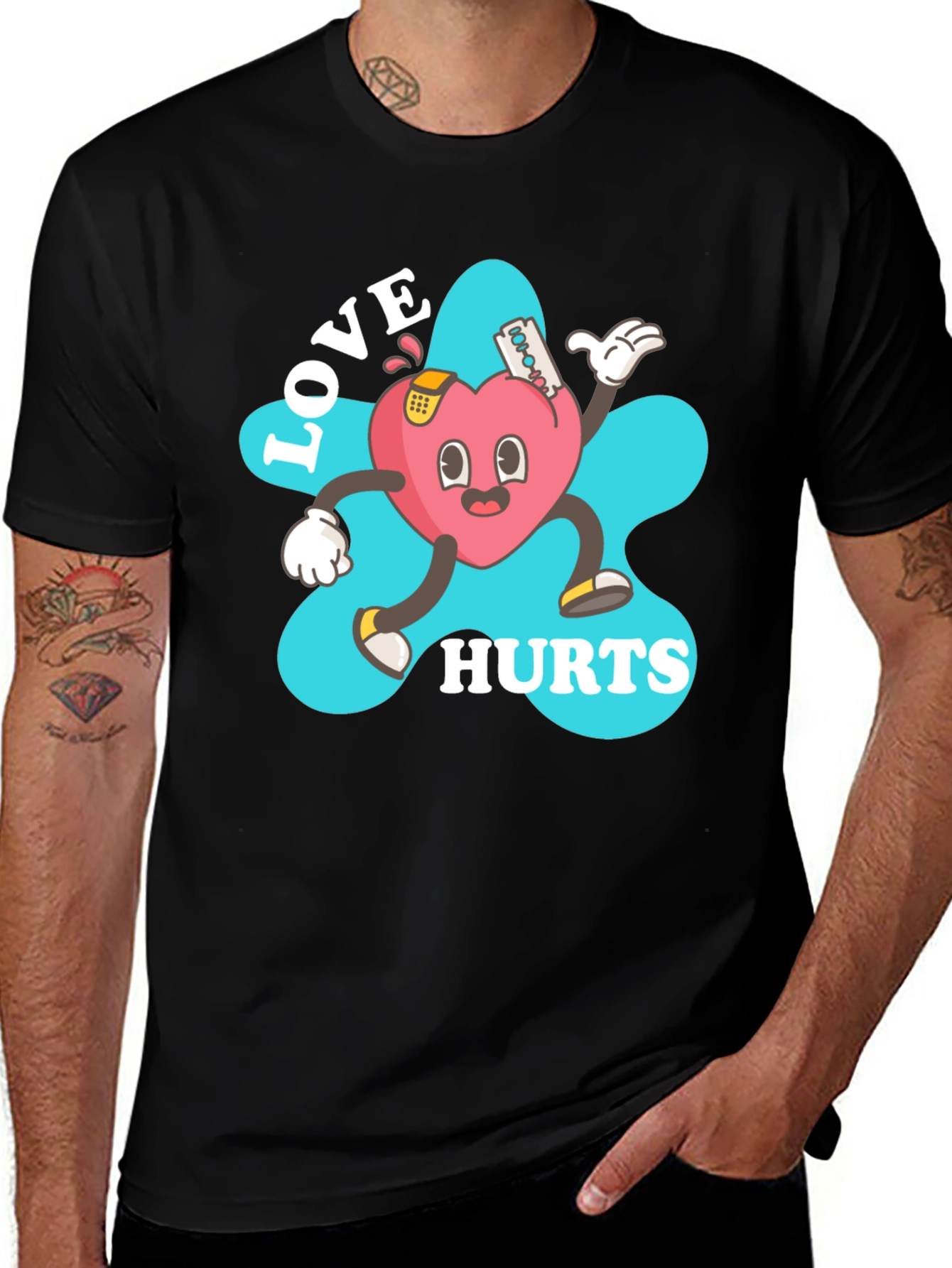 Variant 15 of Love Hurts Cartoon Heart Graphic Black T-Shirt
