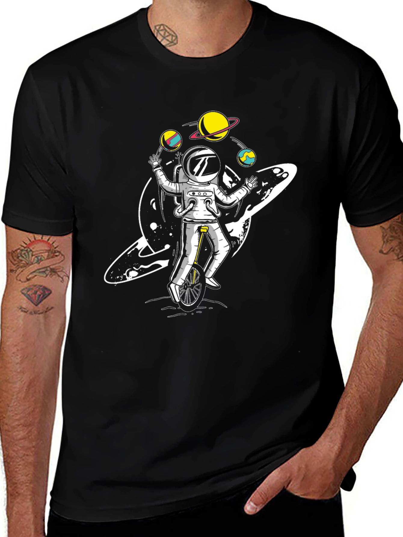 Astronaut Juggling Planets Graphic Tee