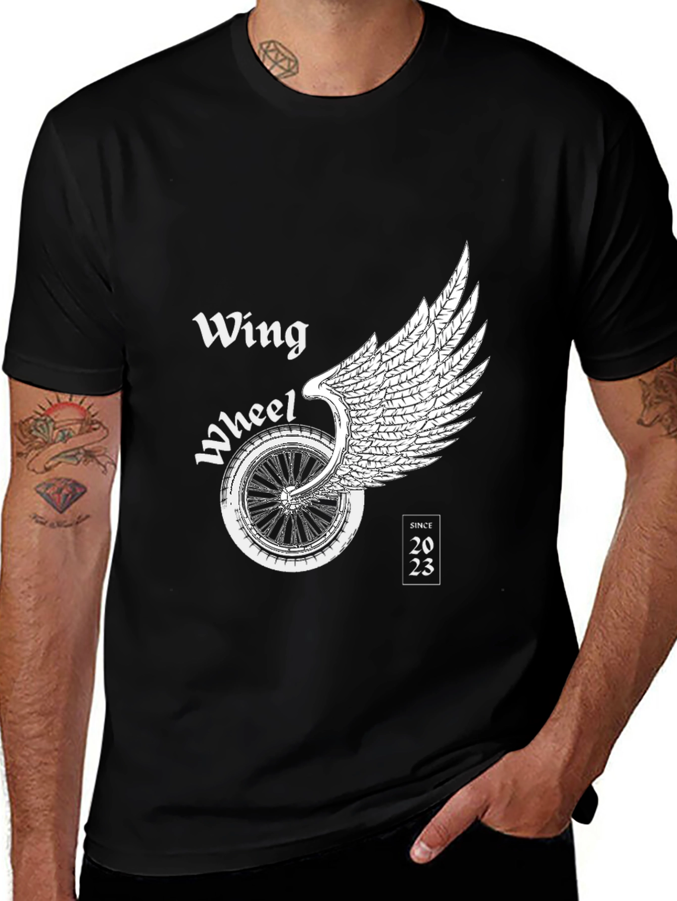Variant 11 of Wing Wheel Black Graphic Tee - Since 2023