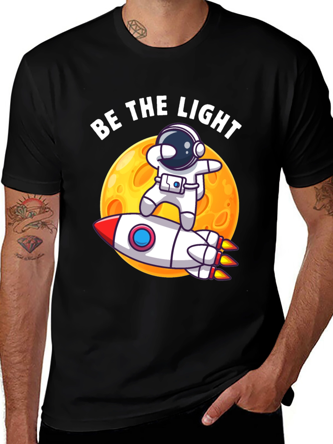 Variant 24 of Be The Light Astronaut Rocket Graphic T-Shirt