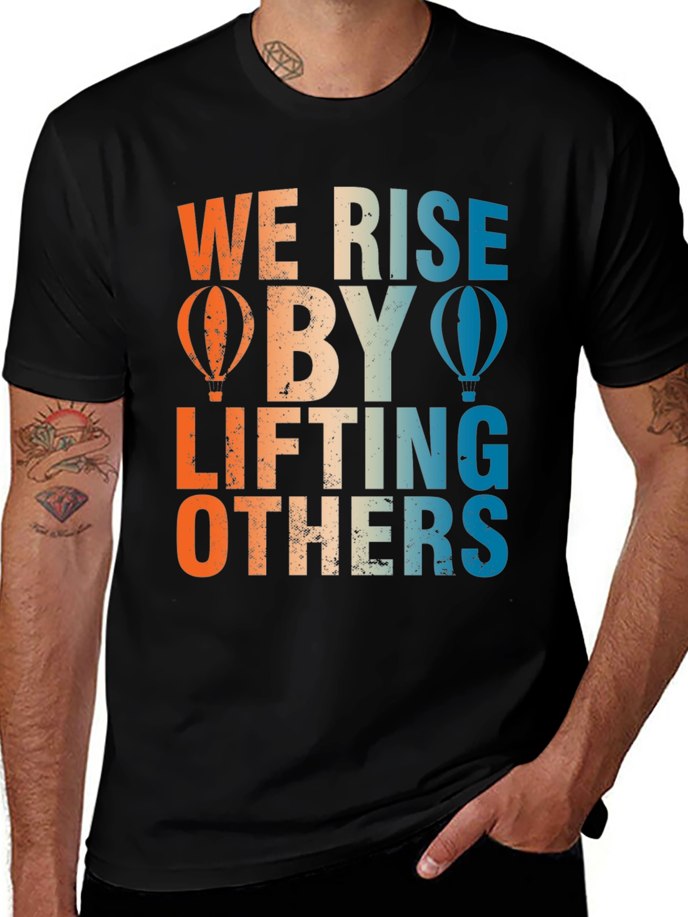 Variant 22 of We Rise by Lifting Others Graphic Tee