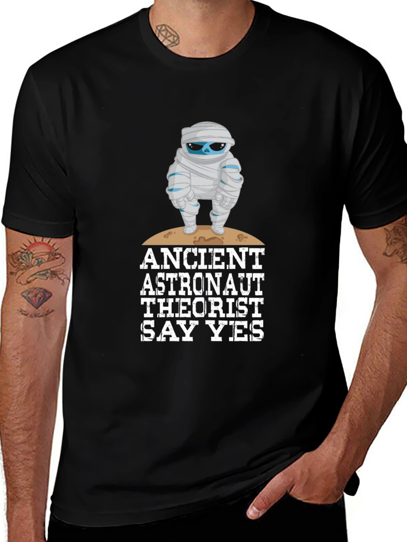 Variant 23 of Ancient Astronaut Theorist Mummy Graphic Tee